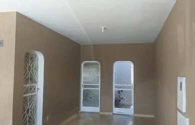 Imagem: A casa possui 3 Dormitórios, 2 Banheiros, 3 Vagas na garagem