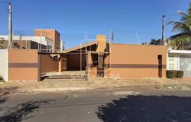 Imagem: A casa possui 3 Dormitórios, 3 Banheiros, 4 Vagas na garagem