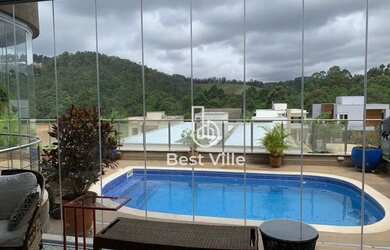 Imagem: A casa em condomínio possui 4 Dormitórios, 5 Banheiros, 3