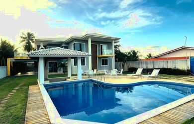 Imagem: A casa em condomínio possui 5 Dormitórios, 5 Banheiros, 4