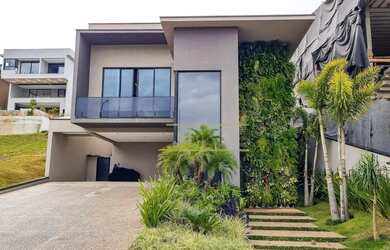 Imagem: A casa em condomínio possui 4 Dormitórios, 5 Banheiros, 4