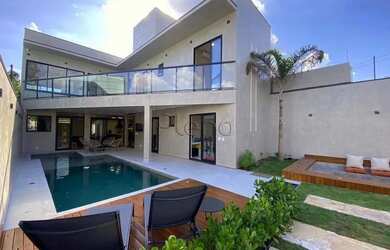 Imagem: A casa possui 5 Dormitórios, 5 Banheiros, 2 Vagas na garagem