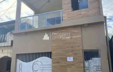 Imagem: A casa possui 3 Dormitórios, 3 Banheiros, 2 Vagas na garagem