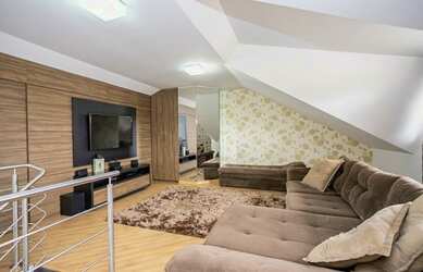 Imagem: A casa possui 3 Dormitórios, 3 Banheiros, 3 Vagas na garagem