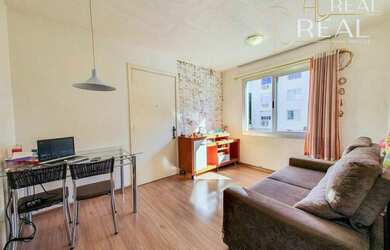 Imagem: O apartamento possui 2 Dormitórios, 1 Banheiro, 1 Vaga na garagem