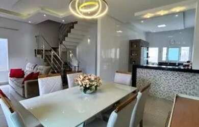 Imagem: A casa possui 3 Dormitórios, 4 Banheiros, 3 Vagas na garagem