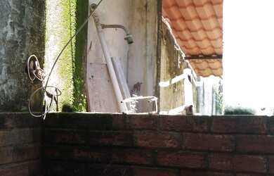 Imagem: A casa possui 3 Dormitórios, 2 Vagas na garagem e está localizado