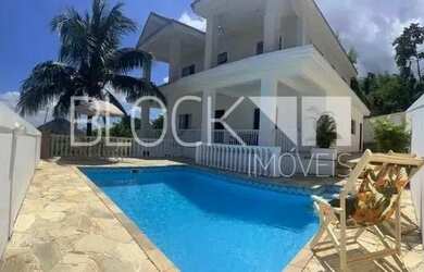 Imagem: A casa em condomínio possui 5 Dormitórios, 5 Banheiros, 4