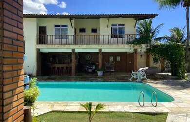 Imagem: A casa possui 5 Dormitórios, 5 Banheiros, 5 Vagas na garagem