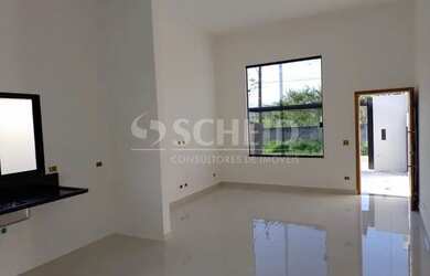 Imagem: A casa possui 3 Dormitórios, 2 Banheiros, 2 Vagas na garagem