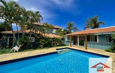 Imagem: A casa em condomínio possui 4 Dormitórios, 4 Banheiros, 4