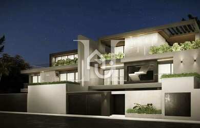 Imagem: A casa possui 4 Dormitórios, 4 Banheiros, 4 Vagas na garagem