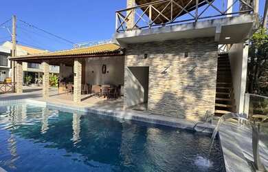 Imagem: A casa em condomínio possui 4 Dormitórios, 5 Banheiros, 4