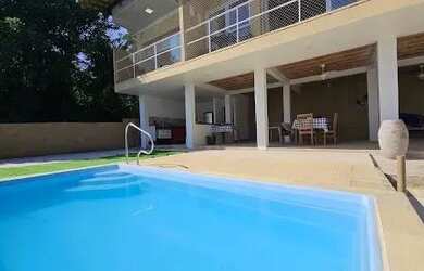 Imagem: A casa em condomínio possui 4 Dormitórios, 3 Banheiros, 2