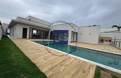 Imagem: A casa em condomínio possui 4 Dormitórios, 5 Banheiros, 1