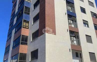 Imagem: O apartamento possui 3 Dormitórios, 2 Banheiros, 2 Vagas na