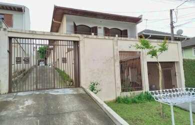 Imagem: A casa possui 3 Dormitórios, 1 Banheiro, 1 Vaga na garagem