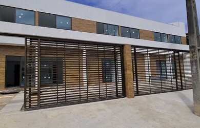 Imagem: A casa possui 2 Dormitórios, 2 Banheiros, 1 Vaga na garagem