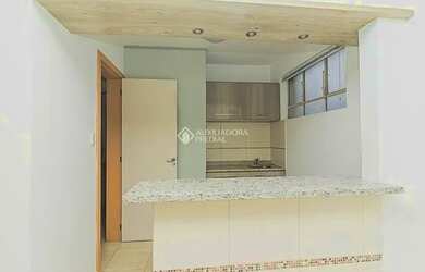 Imagem: O apartamento possui 1 Dormitório, 1 Banheiro, 1 Vaga na garagem