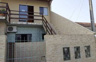 Imagem: A casa possui 5 Dormitórios, 2 Banheiros, 250m² de Área e