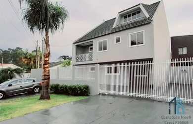 Imagem: A casa possui 3 Dormitórios, 3 Banheiros, 5 Vagas na garagem