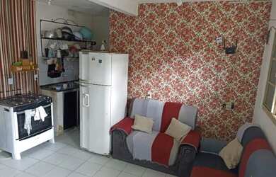 Imagem: A casa possui 2 Dormitórios e 1 Banheiro e está localizado