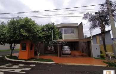 Imagem: A casa possui 4 Dormitórios, 5 Banheiros, 4 Vagas na garagem