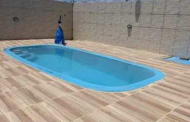 Imagem: A casa possui 3 Dormitórios, 5 Vagas na garagem e está localizado