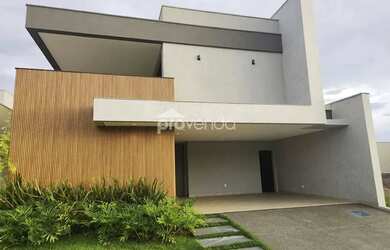 Imagem: A casa possui 4 Dormitórios, 5 Banheiros, 2 Vagas na garagem