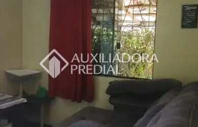 Imagem 7: Terreno de 520 m² arborizado com casa de alvenaria de 2 dormitórios...