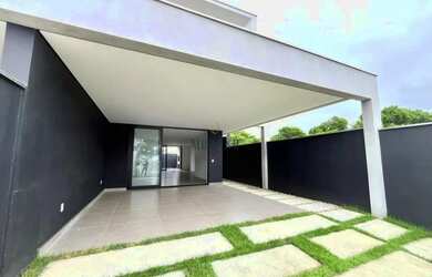 Imagem: A casa possui 3 Dormitórios, 4 Banheiros, 3 Vagas na garagem