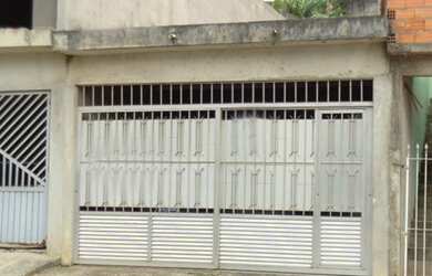 Imagem: A casa possui 2 Dormitórios, 2 Banheiros, 2 Vagas na garagem