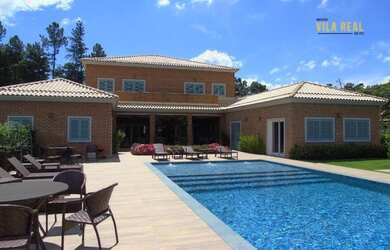 Imagem: A casa em condomínio possui 5 Dormitórios, 5 Banheiros, 5