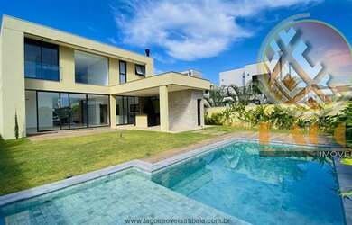 Imagem: A casa em condomínio possui 4 Dormitórios, 5 Banheiros, 4