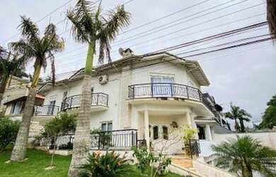 Imagem: A casa em condomínio possui 3 Dormitórios, 5 Banheiros, 5