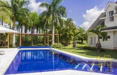 Imagem: A casa em condomínio possui 5 Dormitórios, 5 Banheiros, 5