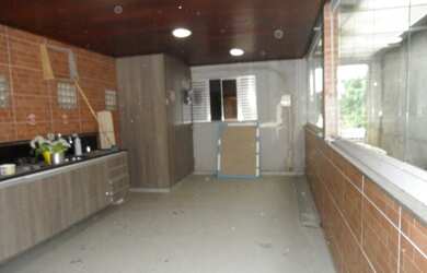 Imagem: A casa possui 3 Dormitórios, 3 Banheiros, 3 Vagas na garagem