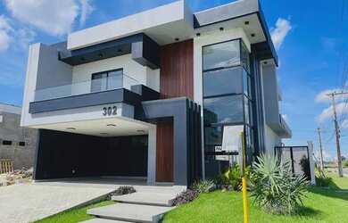 Imagem: A casa em condomínio possui 4 Dormitórios, 5 Banheiros, 4