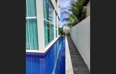 Imagem: A casa em condomínio possui 4 Dormitórios, 5 Banheiros, 4