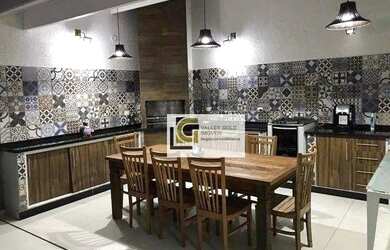 Imagem: A casa possui 3 Dormitórios, 4 Banheiros, 2 Vagas na garagem