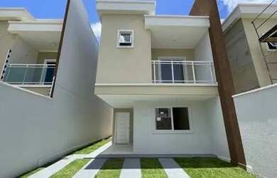 Imagem: A casa possui 3 Dormitórios, 2 Banheiros, 2 Vagas na garagem