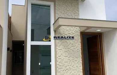 Imagem: A casa possui 3 Dormitórios, 2 Banheiros, 1 Vaga na garagem