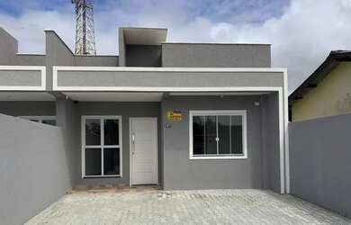 Imagem: A casa possui 3 Dormitórios, 3 Banheiros, 3 Vagas na garagem