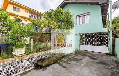 Imagem: A casa possui 3 Dormitórios, 2 Banheiros, 2 Vagas na garagem