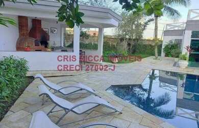 Imagem: A casa possui 5 Dormitórios, 5 Banheiros, 5 Vagas na garagem