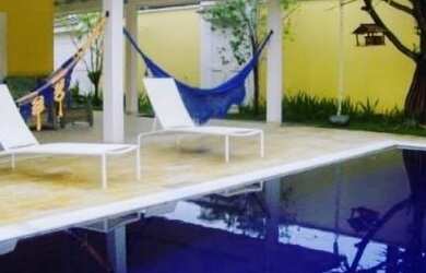 Imagem: A casa possui 3 Dormitórios, 4 Banheiros, 1 Vaga na garagem