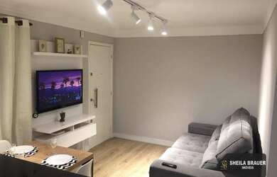 Imagem: O apartamento possui 2 Dormitórios, 1 Banheiro, 1 Vaga na garagem