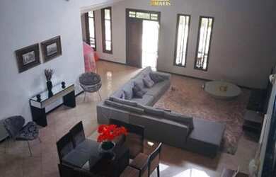 Imagem: A casa em condomínio possui 4 Dormitórios, 5 Banheiros, 4