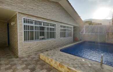 Imagem: A casa possui 4 Dormitórios, 4 Banheiros, 2 Vagas na garagem