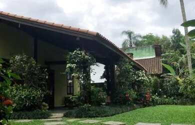 Imagem: A casa possui 2 Dormitórios, 2 Banheiros, 5 Vagas na garagem